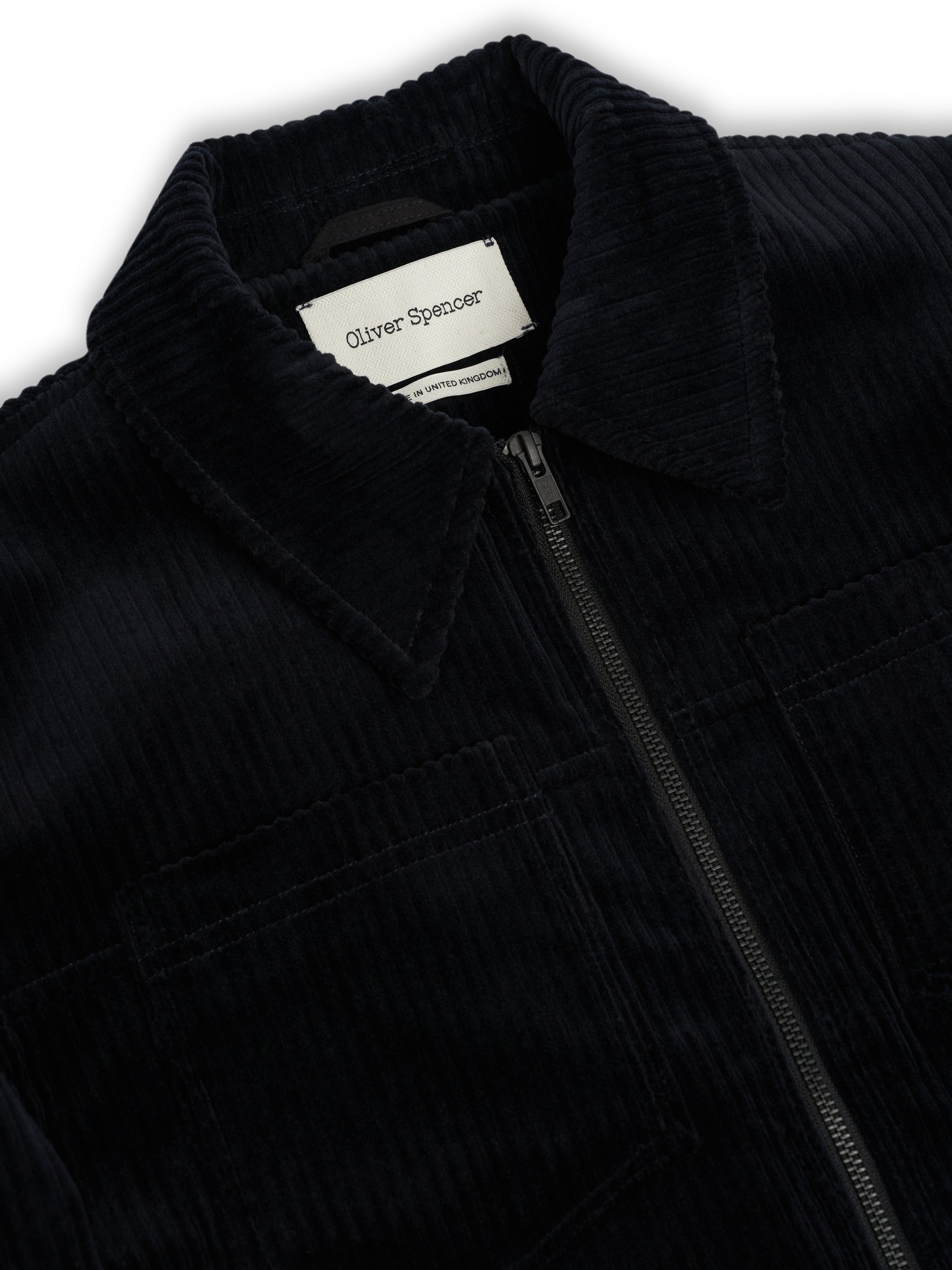 Close up collar shot of Oliver Spencer Men's Midnight Navy Cotton Corduroy Trucker Jacket Flat Shot