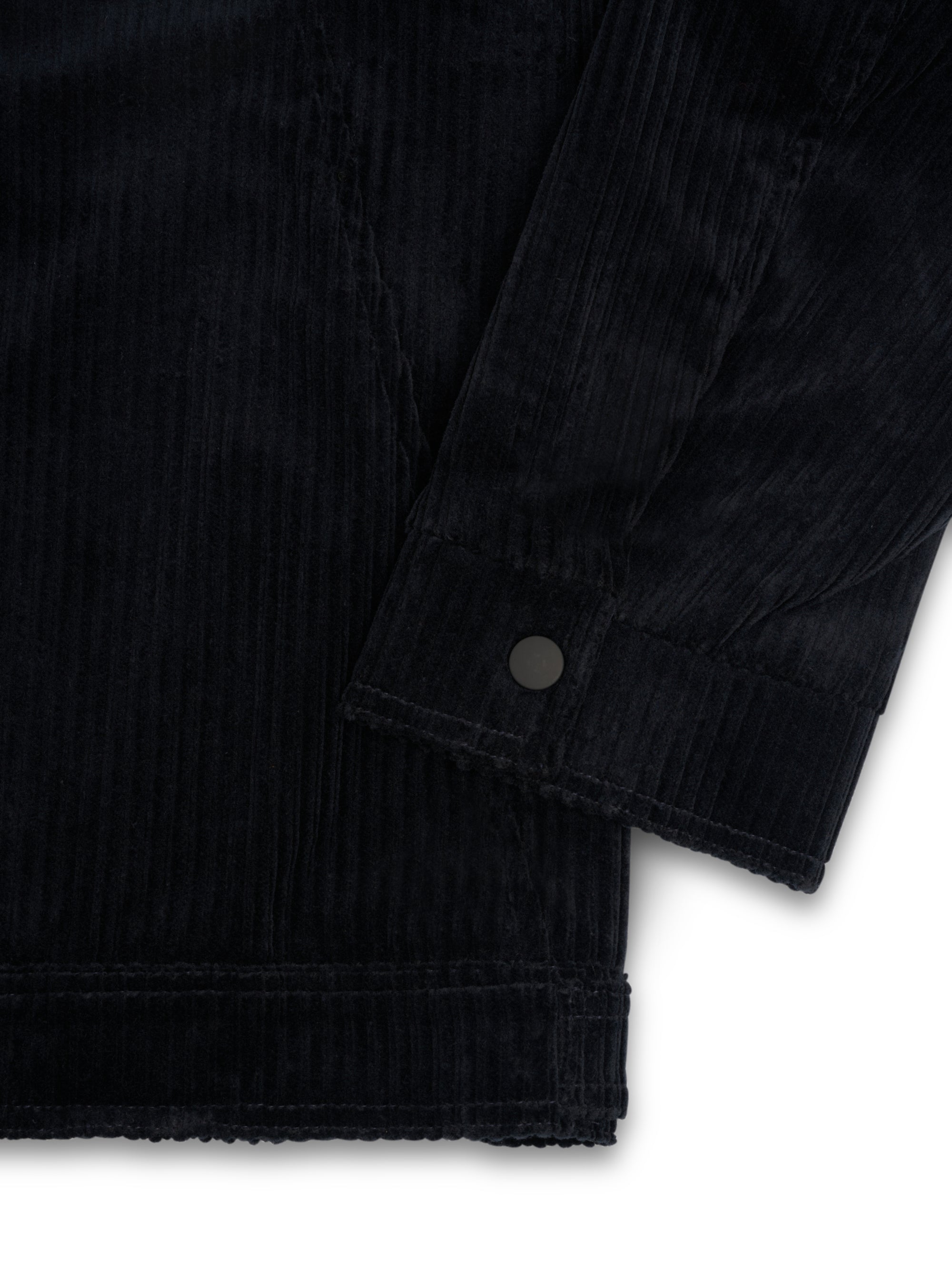 Close up cuff shot of Oliver Spencer Men's Midnight Navy Cotton Corduroy Trucker Jacket Flat Shot