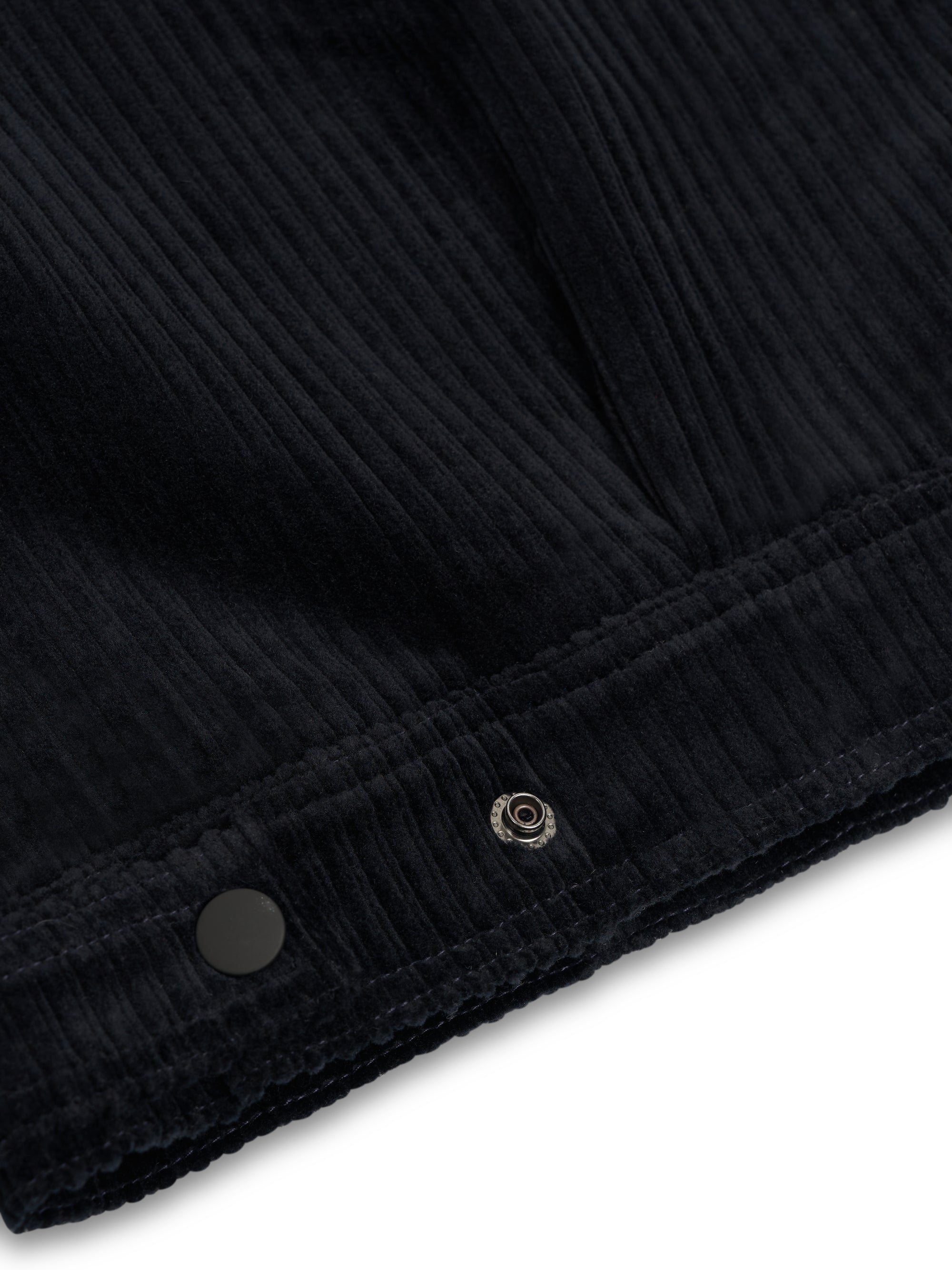 Close up shot of bottom of Oliver Spencer Men's Midnight Navy Cotton Corduroy Trucker Jacket Flat Shot