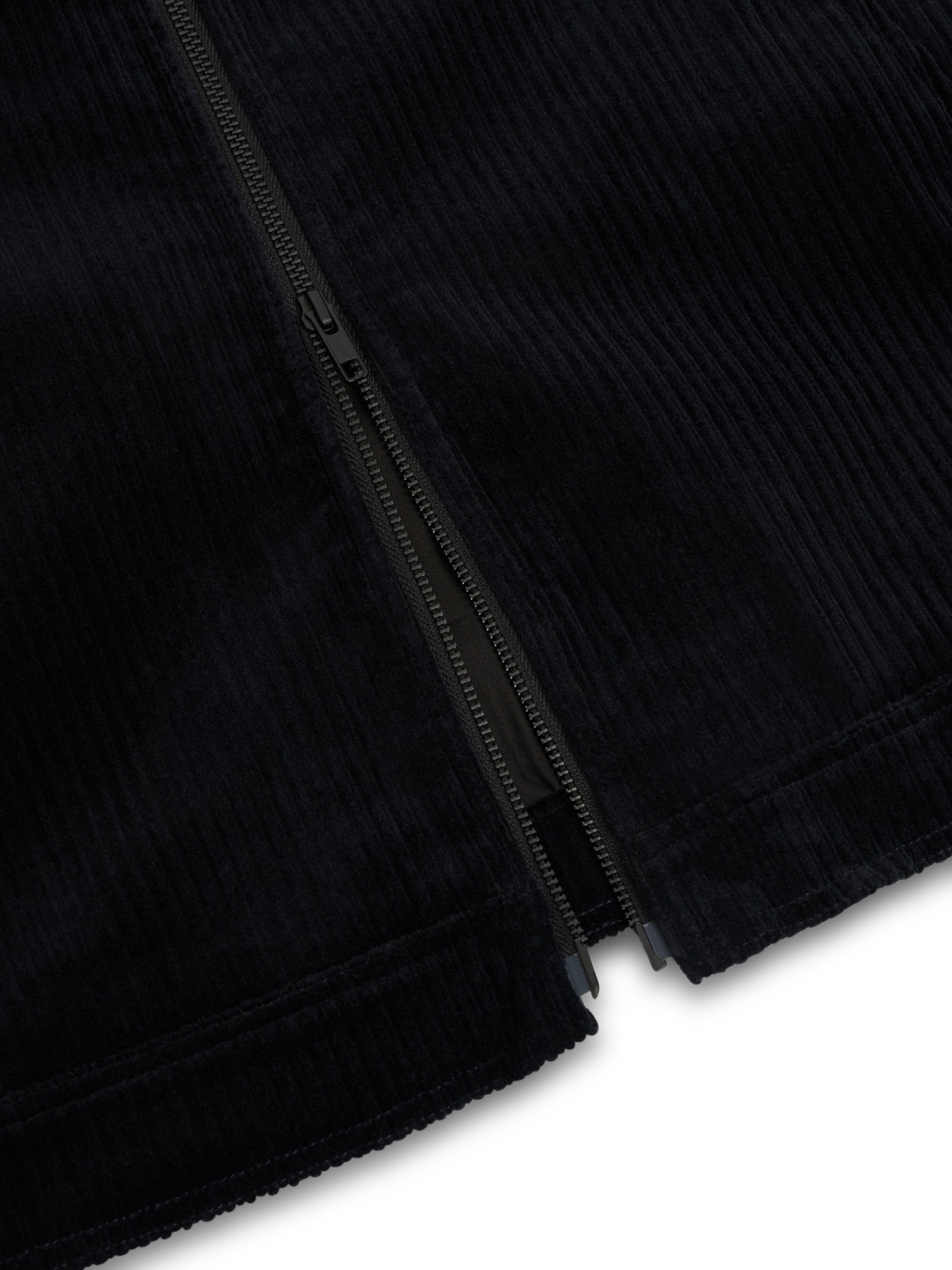 Close up shot of bottom of Oliver Spencer Men's Midnight Navy Cotton Corduroy Trucker Jacket Flat Shot