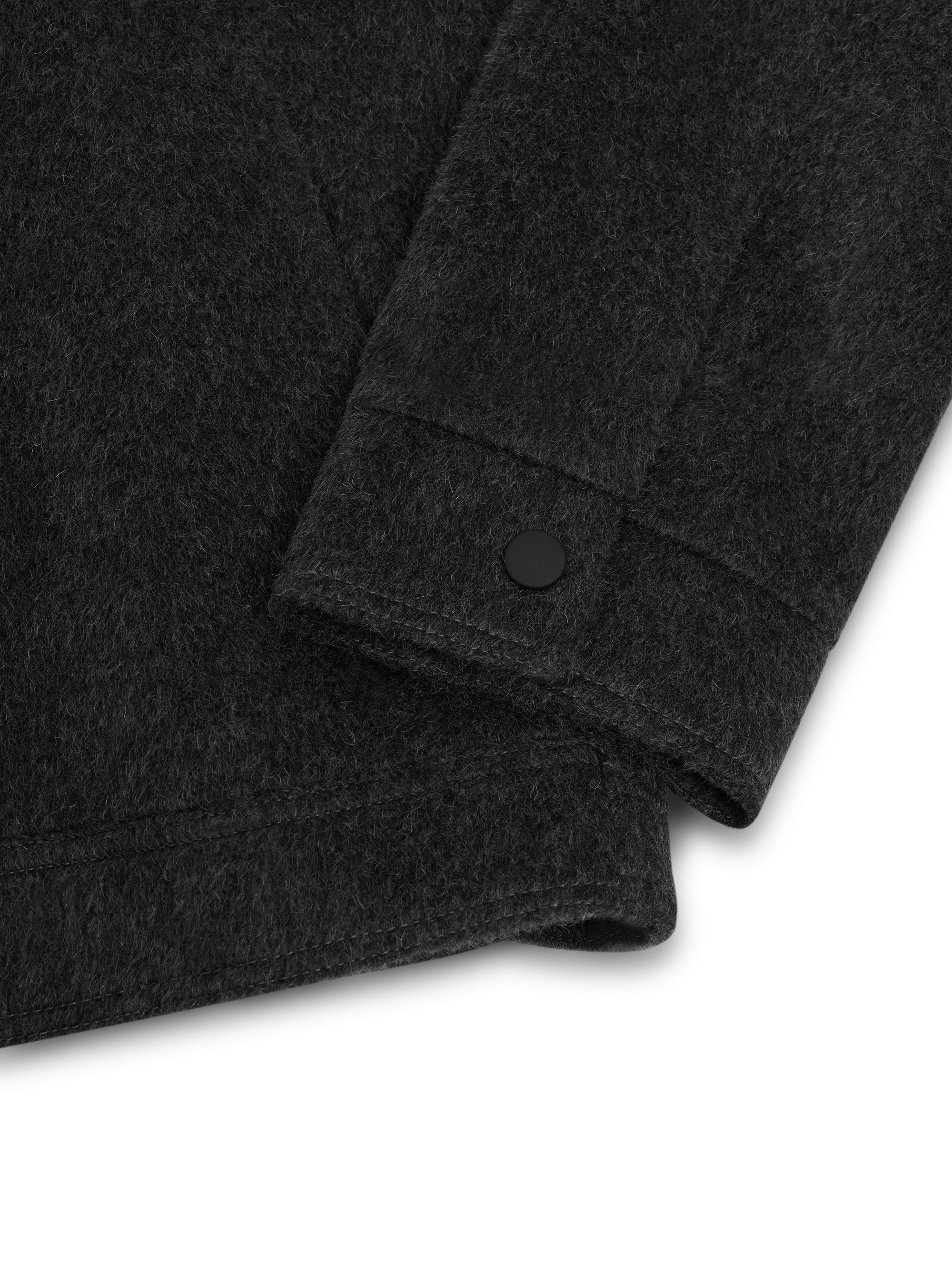Close up cuff shot of Oliver Spencer Men's Charcoal Recycled Wool And Mohair Trucker Jacket
