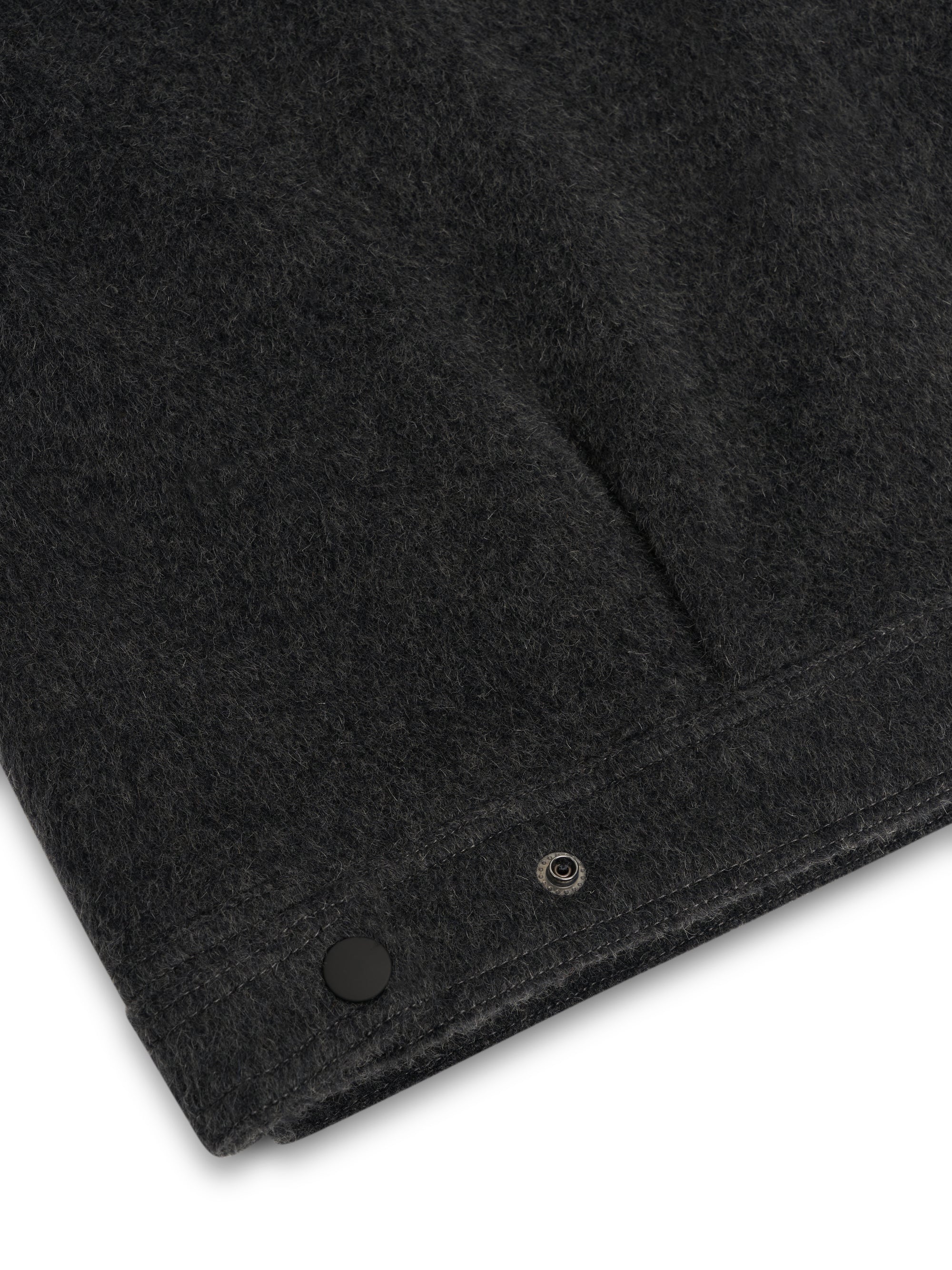 Close up of bottom of Oliver Spencer Men's Charcoal Recycled Wool And Mohair Trucker Jacket