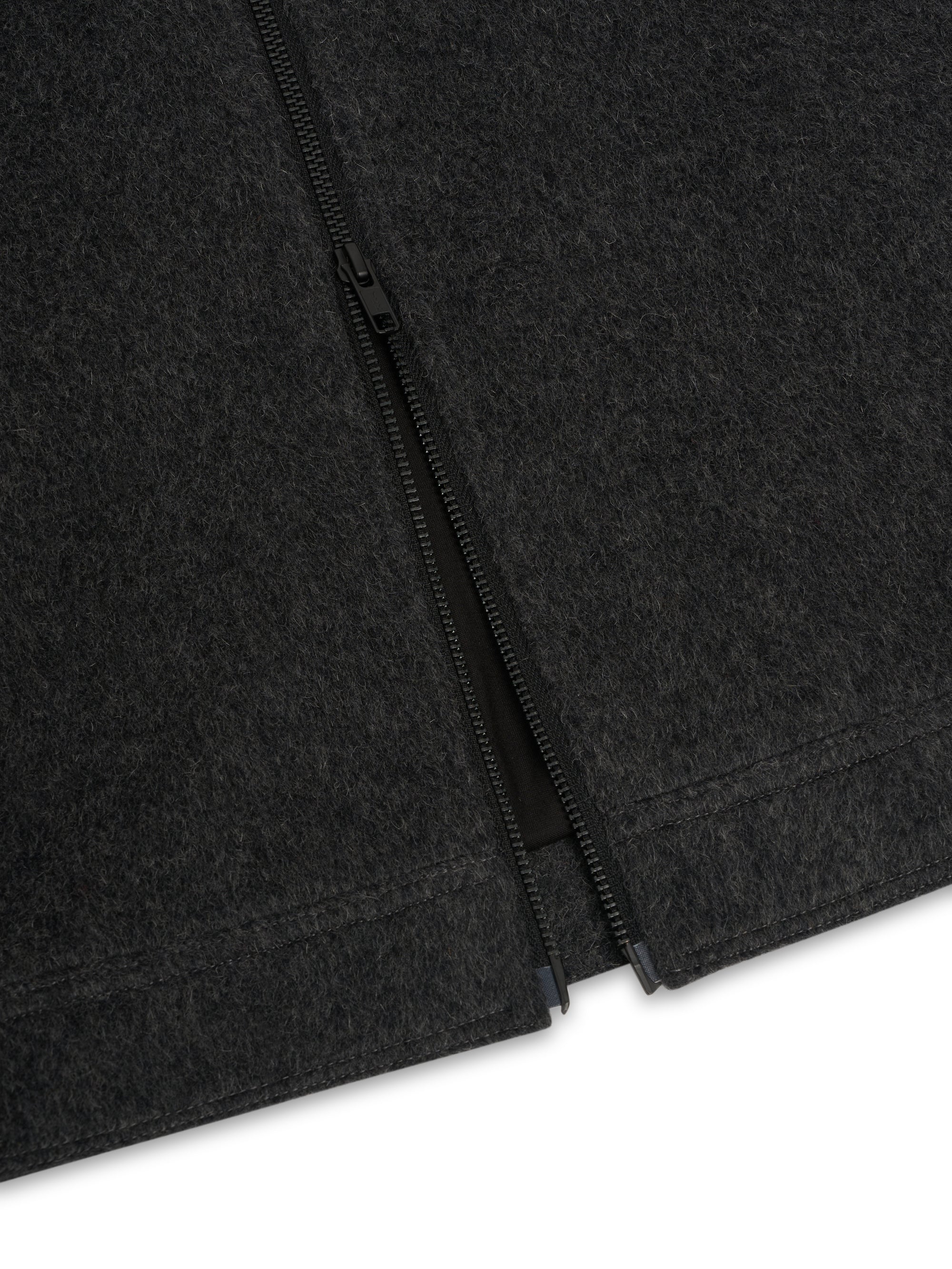 Close up of bottom of Oliver Spencer Men's Charcoal Recycled Wool And Mohair Trucker Jacket