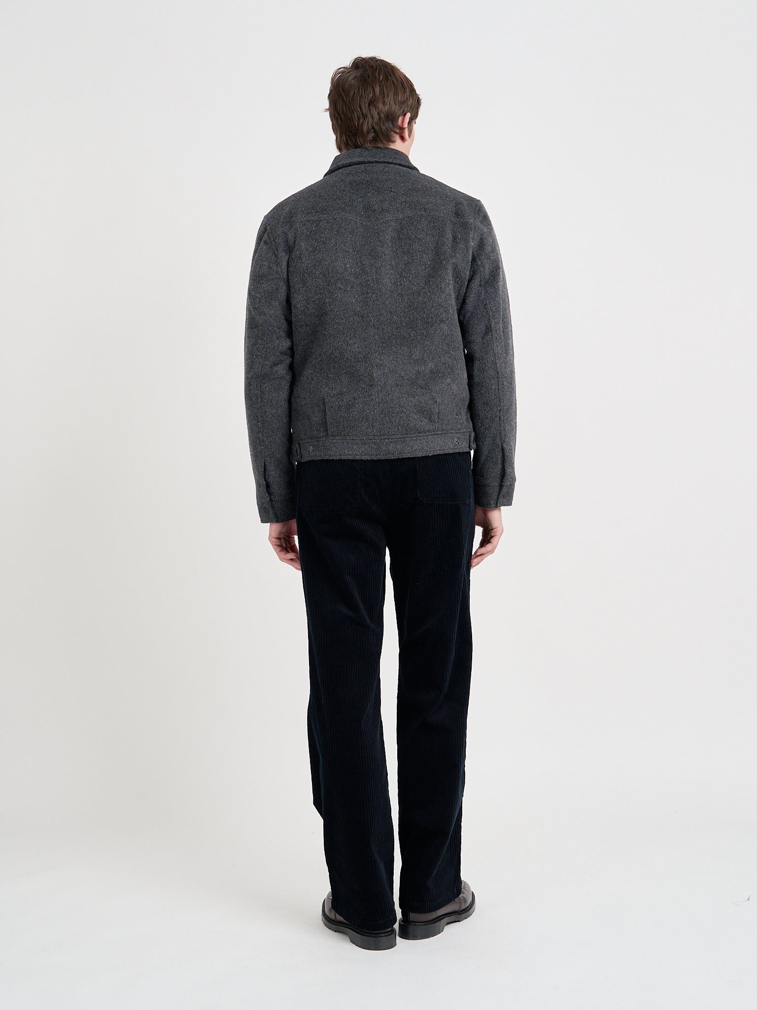 Back shot of model wearing Oliver Spencer Men's Charcoal Recycled Wool And Mohair Trucker Jacket