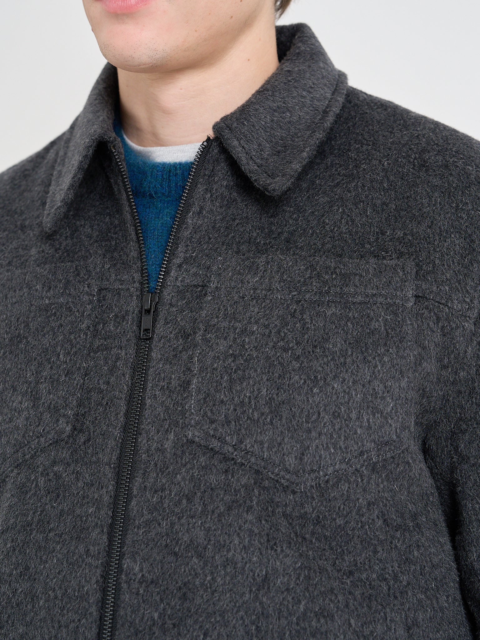 Close up collar shot of model wearing Oliver Spencer Men's Charcoal Recycled Wool And Mohair Trucker Jacket