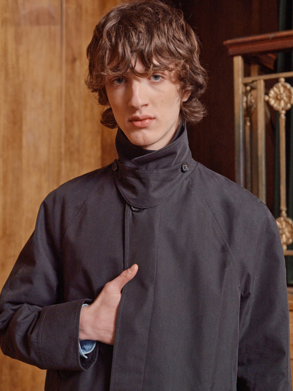 Model in a pinstripe suit, full length