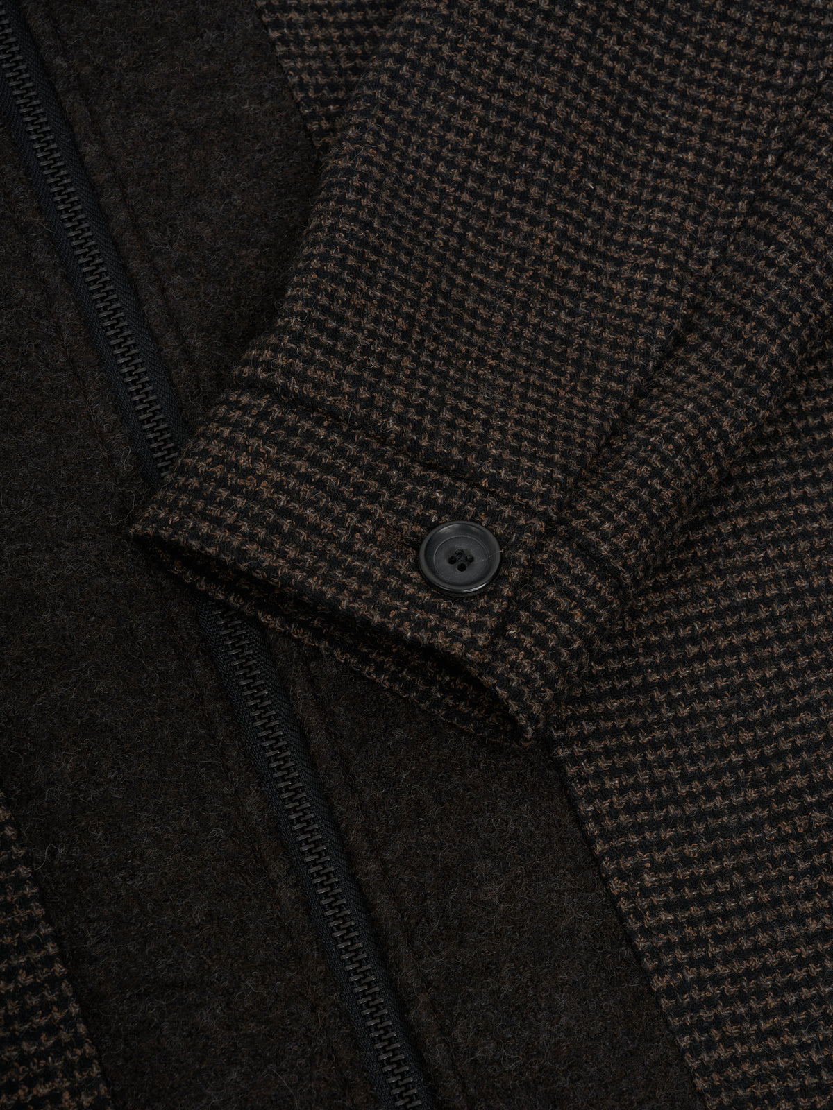 Cuff. A buttoned cuff.