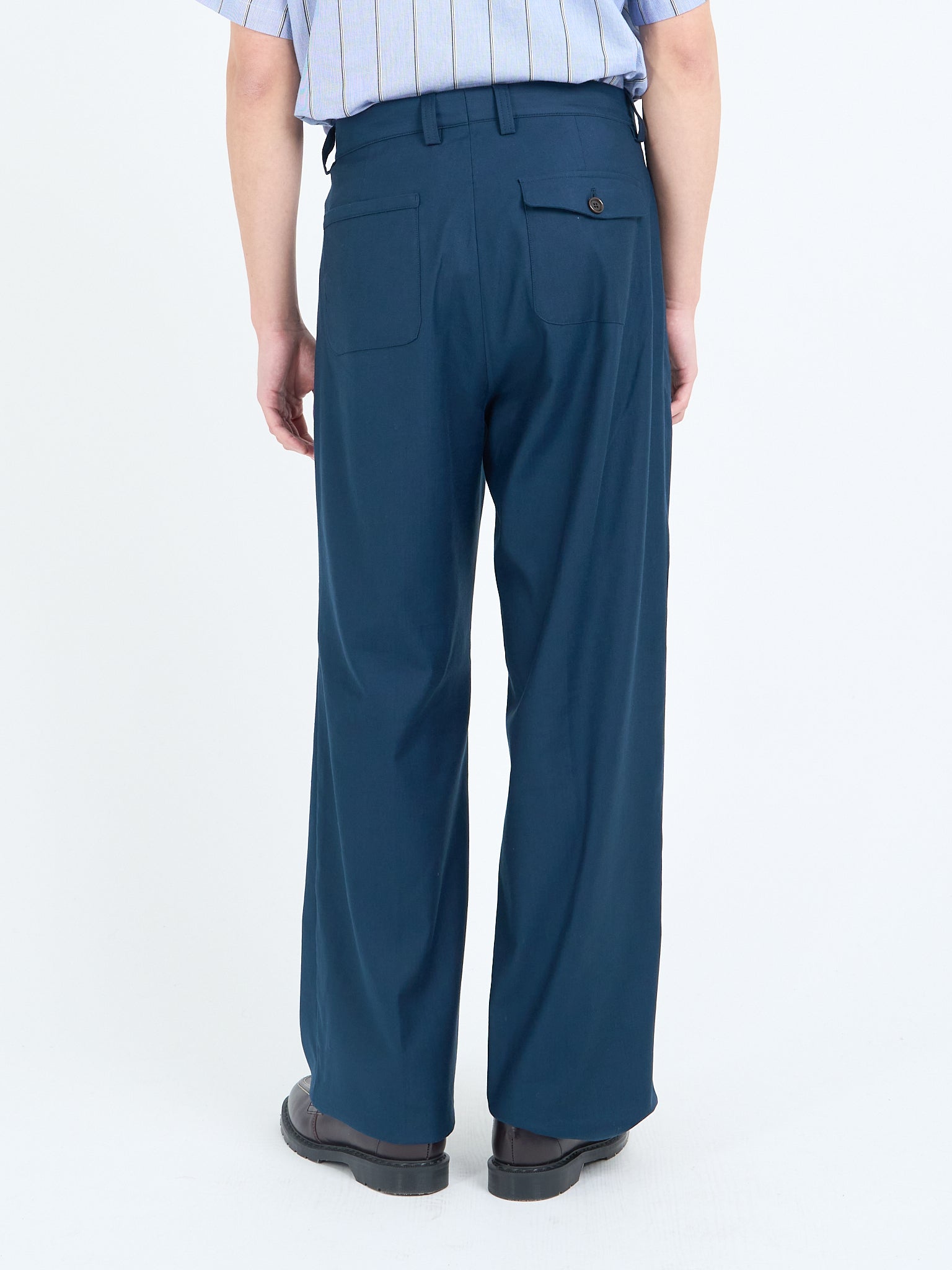 Navy wide-leg trousers with rear patch pockets, back view