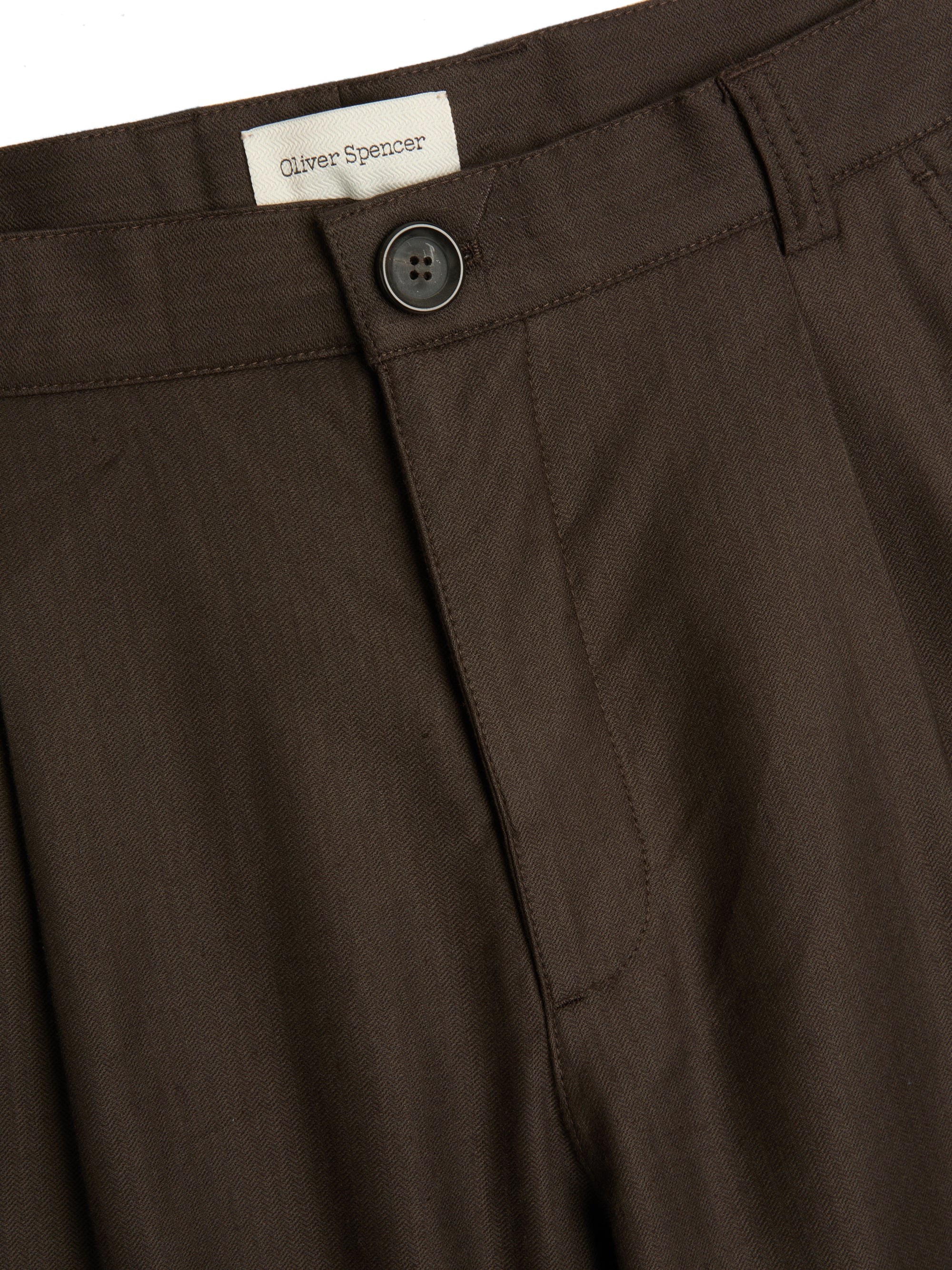 Oliver Spencer Eastman brown trousers button fastening detail