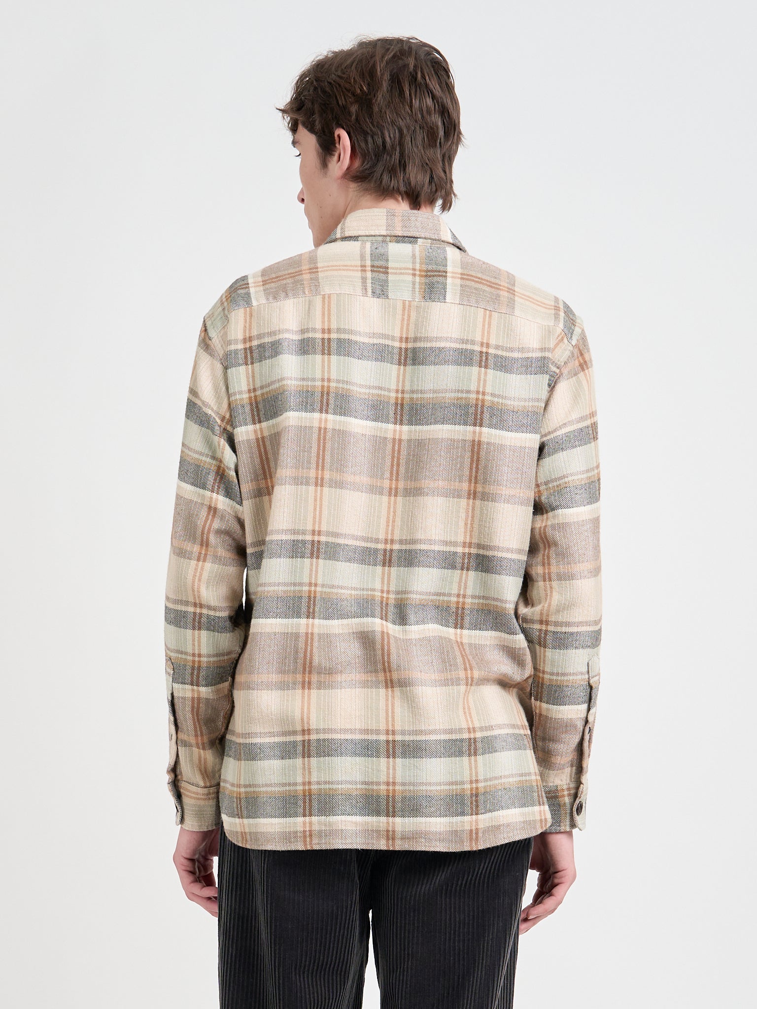 Model is wearing an Oliver Spencer Men's Beige Brushed Cotton Check Overshirt