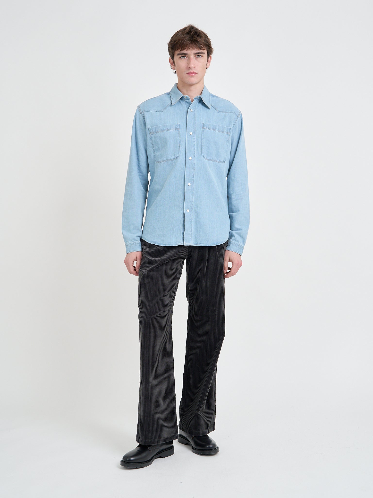 Model is wearing an Oliver Spencer Light Indigo Denim Western Shirt