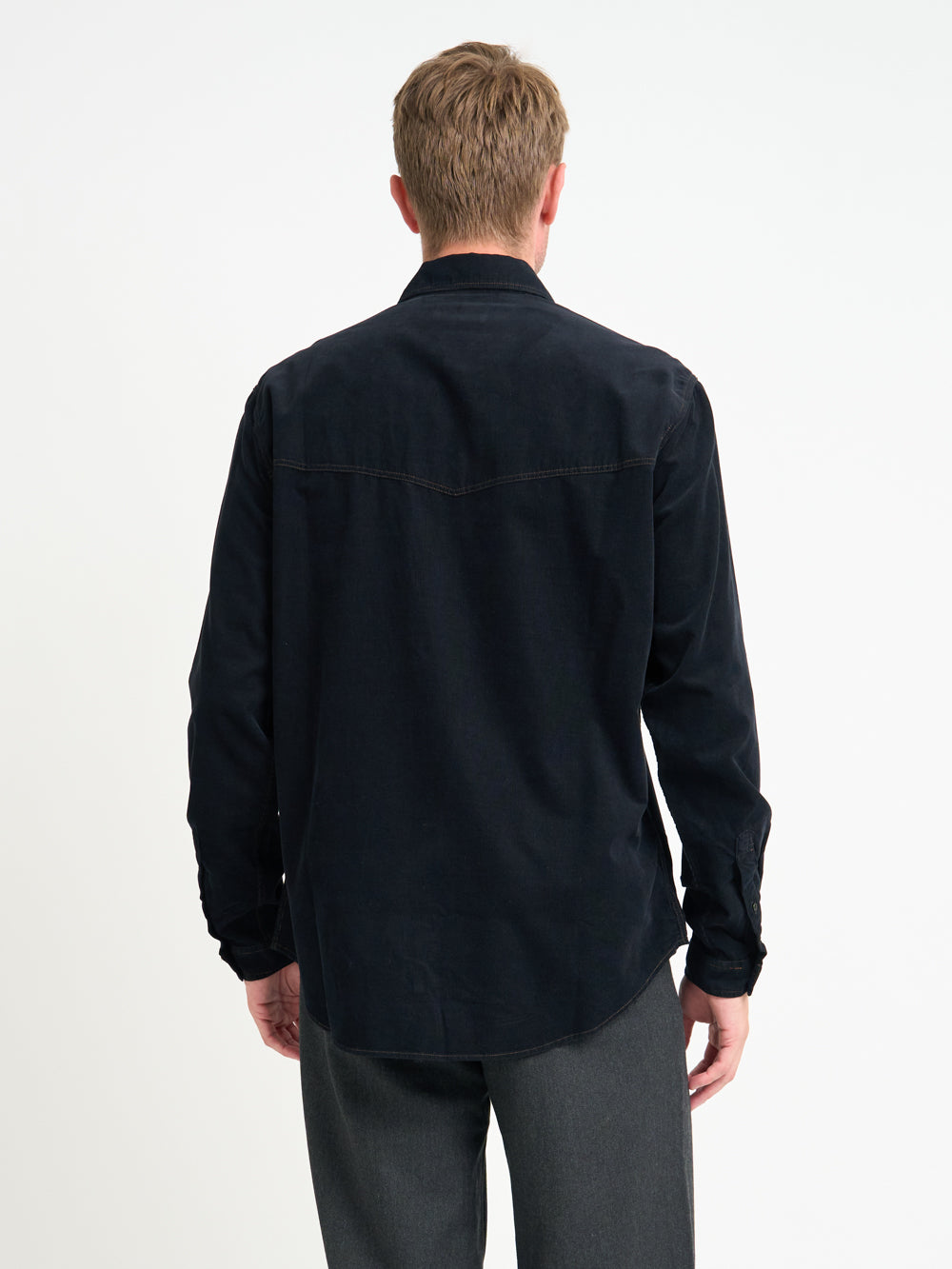 Back shot of model wearing Oliver Spencer Men&#39;s Black Midweight Cotton Corduroy Western Shirt