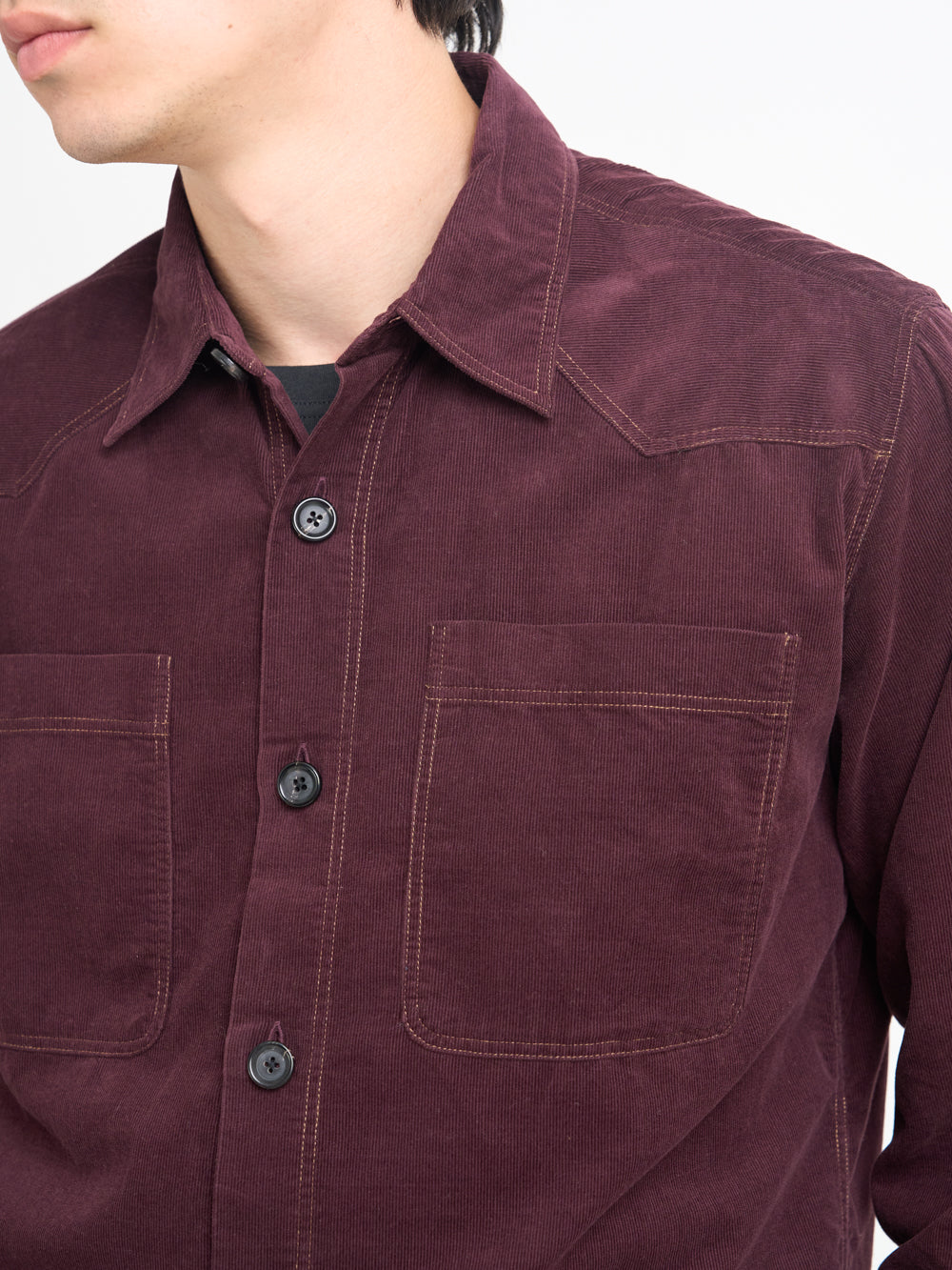 Detailed Collar Shot of Model wearing Oliver Spencer Men&#39;s Burgundy Midweight Cotton Corduroy Western Shirt 
