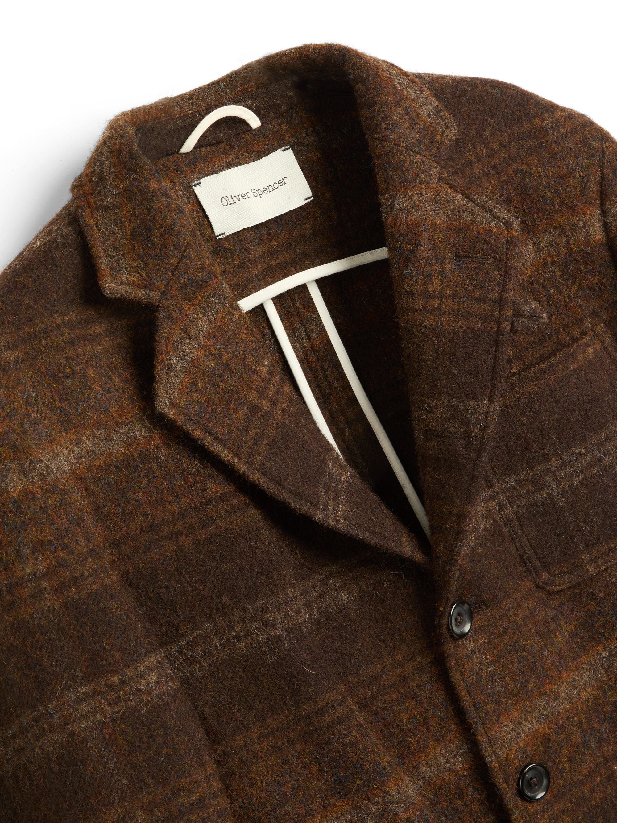 Detailed collar shot of Oliver Spencer Men's Unstructured Notch Lapel Brown Plaid Jacket