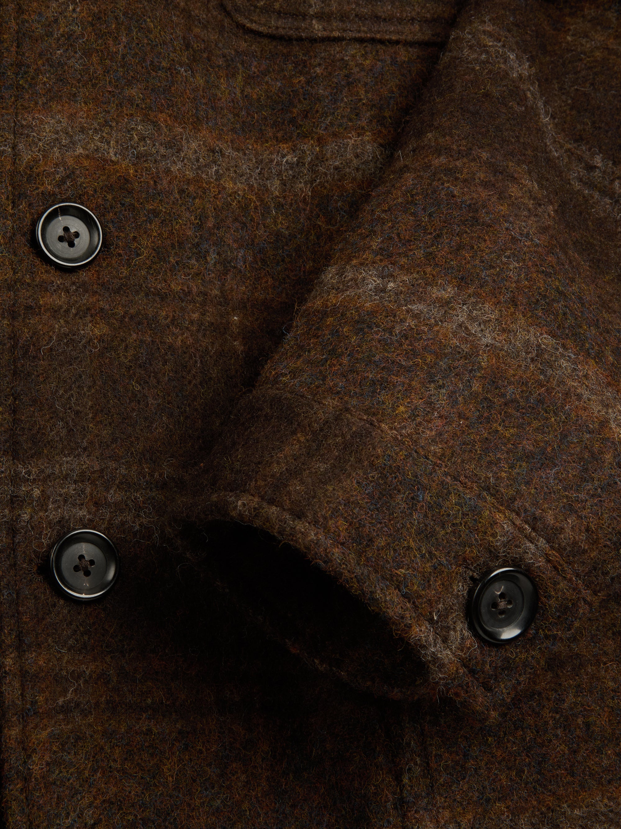 Detailed cuff shot of Oliver Spencer Men's Unstructured Notch Lapel Brown Plaid Jacket