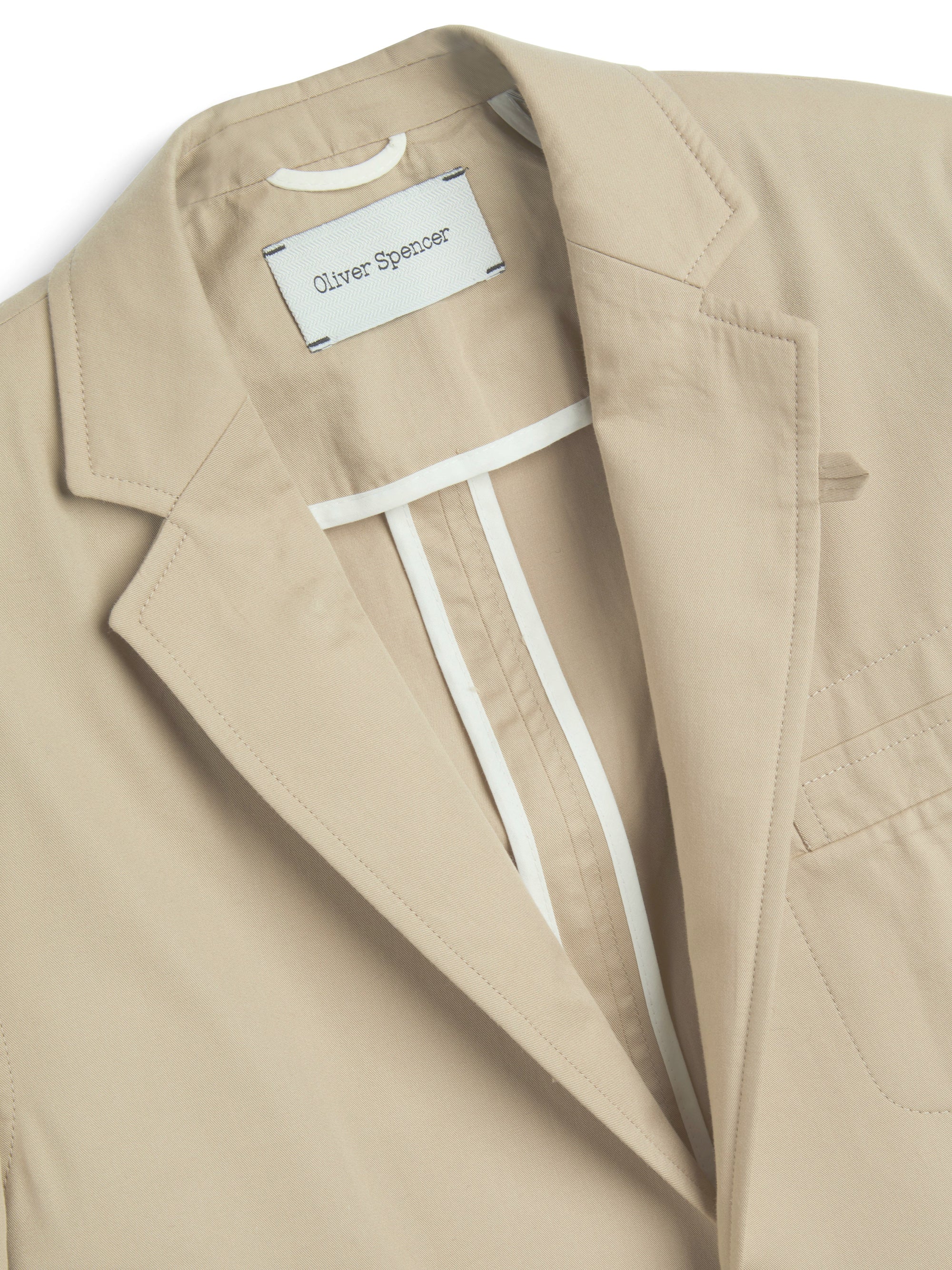 Detailed collar shot of Oliver Spencer Men's Unstructured Notch Lapel Beige Cotton Jacket