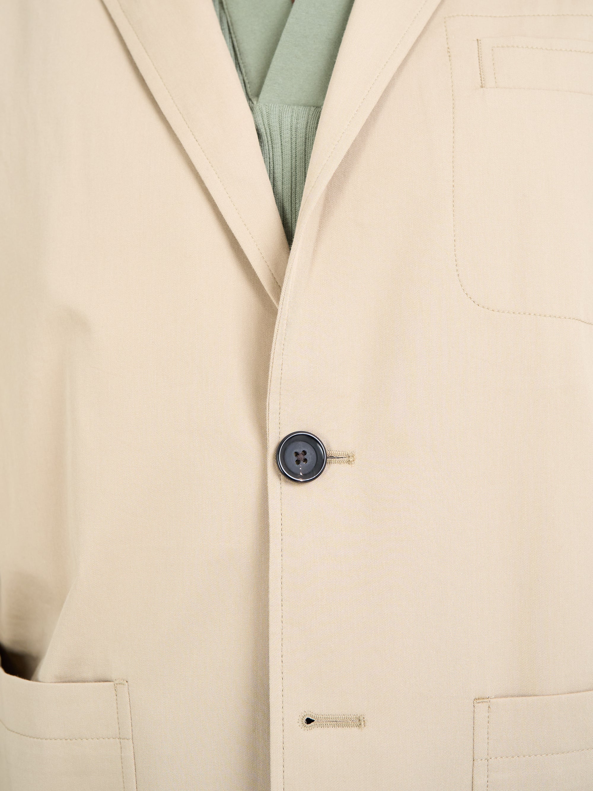 Detailed button shot of Oliver Spencer Men's Unstructured Notch Lapel Beige Cotton Jacket