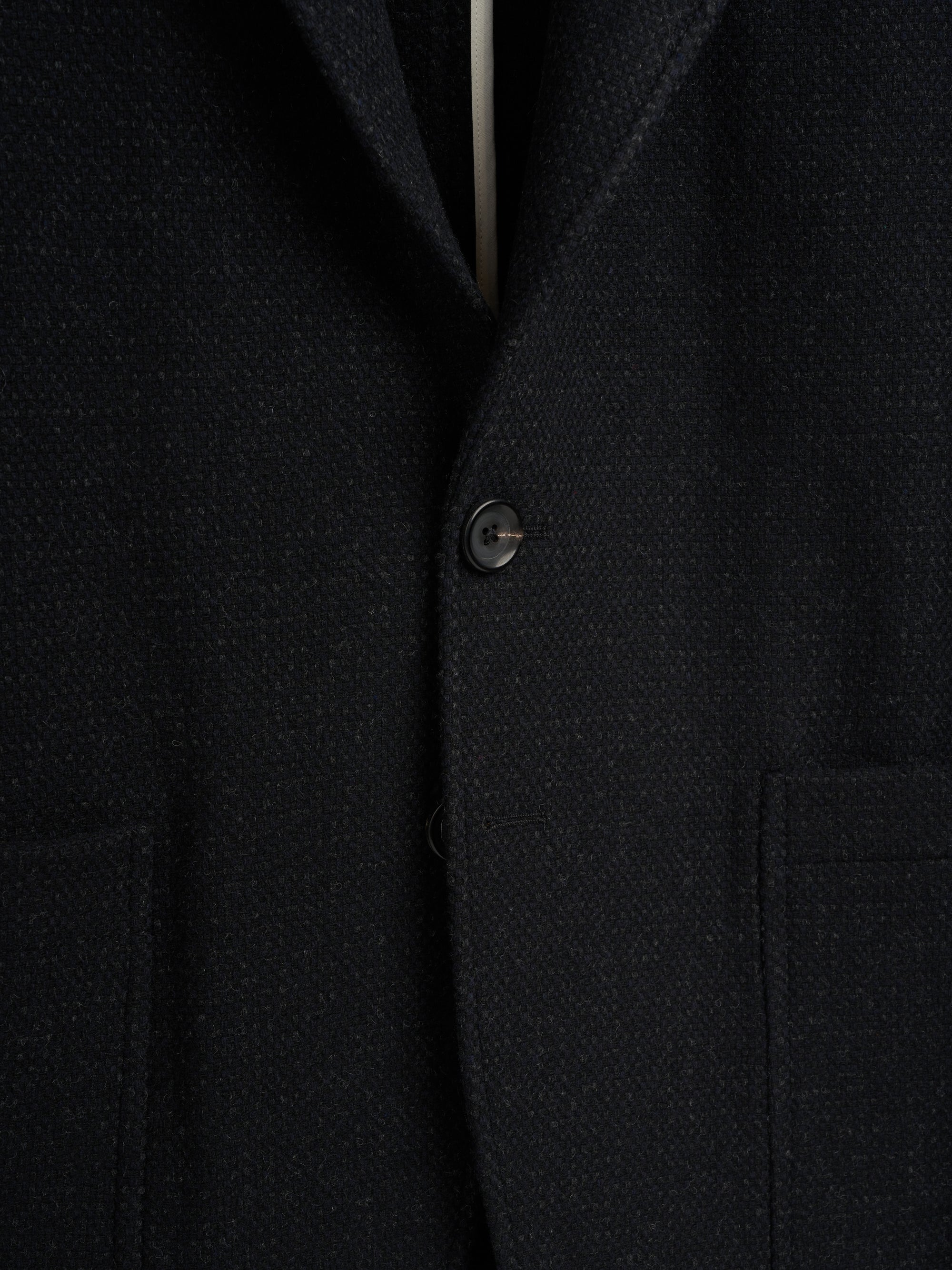 Detailed button shot of Oliver Spencer Men's Black Wool Single-Breasted Black Jacket