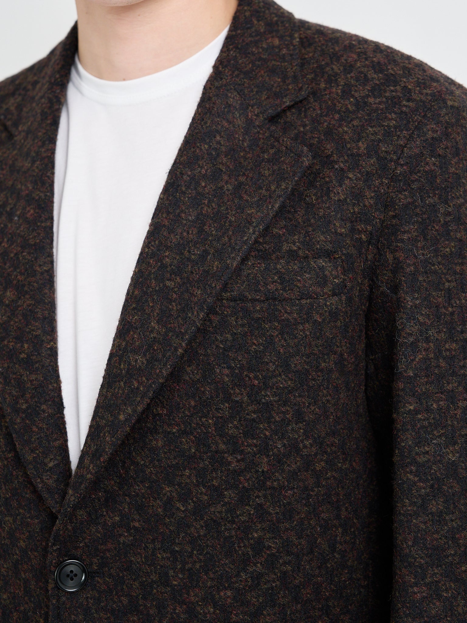 Close up collar shot of model wearing Oliver Spencer Men's Checked Brown Wool Single-Breasted Jacket