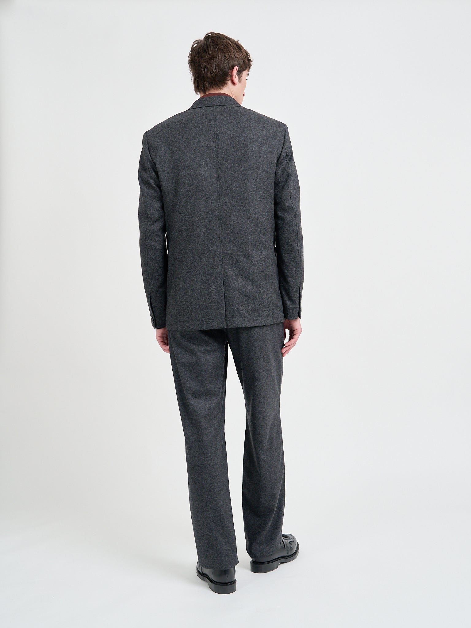 Back shot of model wearing Oliver Spencer Men's Charcoal Grey Wool Single-Breasted Jacket 
