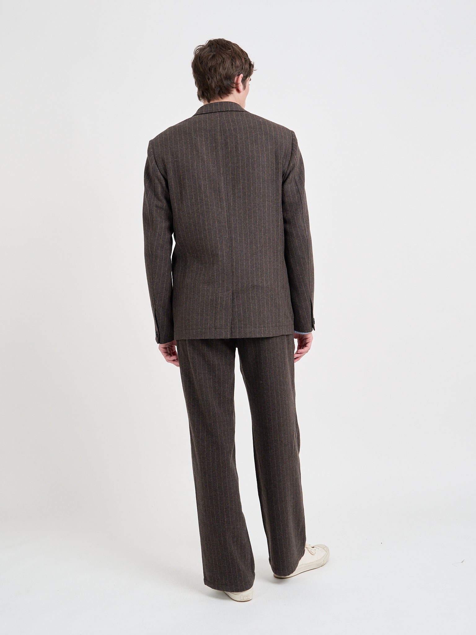 Back shot of model wearing Oliver Spencer Men's Single-Breasted Brown Striped Blazer