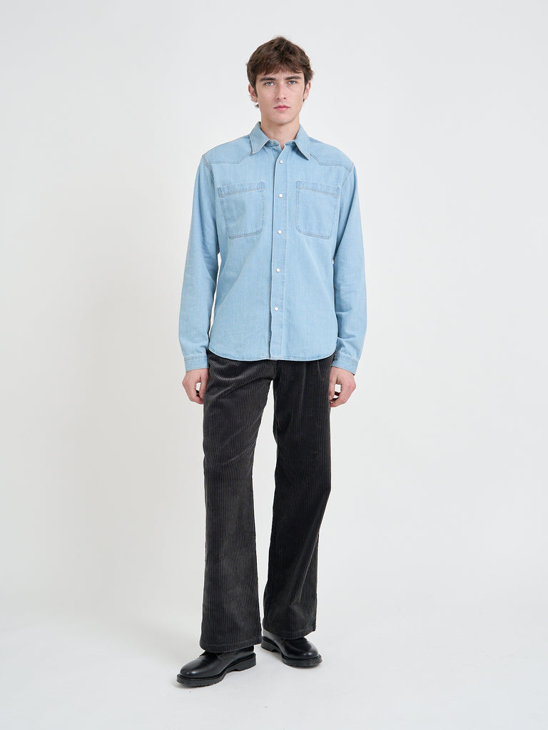 Model is wearing an Oliver Spencer Light Indigo Denim Western Shirt
