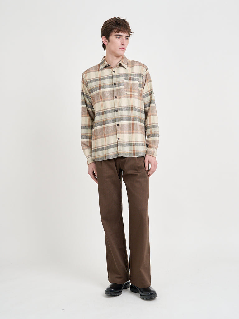 Model is wearing an Oliver Spencer New York Special Shirt in Robbins Multi